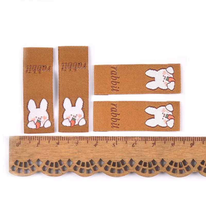 50Pcs Brown Cartoon Rabbit/Carrot Embroidery Labels For Sewing Accessories Care Bags Clothes Handmade Crafts Washable Tag c2890