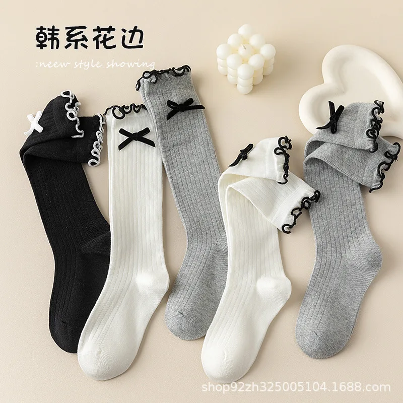 1 pair of calf socks girl spring and autumn solid color college style Korean girl stockings are suitable for children aged 3-12.