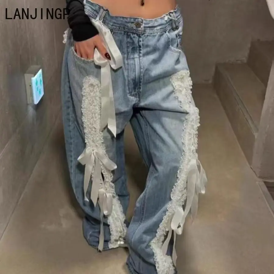 

American retro lace strap splicing jeans women's 2025 summer new design sense loose wide-leg trousers tide
