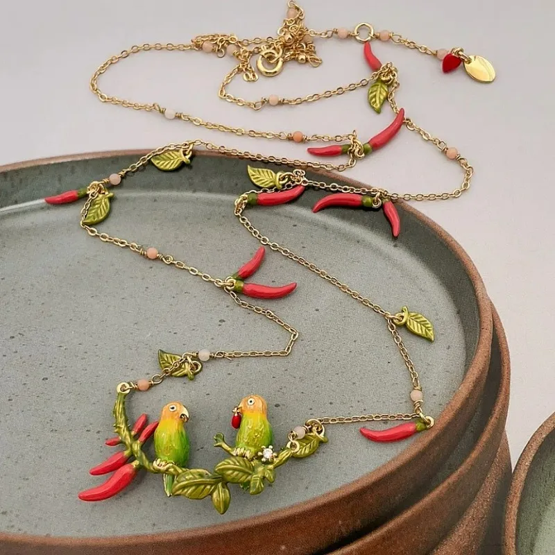 

French Style Light Luxury Sense Handmade Enamel Green Love Bird Holding Red Heart Little Pepper Charms Long Necklace for Women