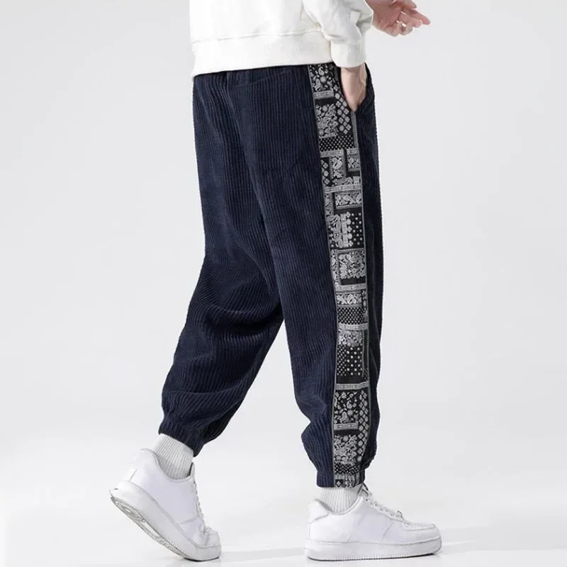 Pantalones de pana con cintura elástica para hombre, ropa de calle Harajuku, chándal informal, pantalones de retazos estampados, moda de otoño e invierno