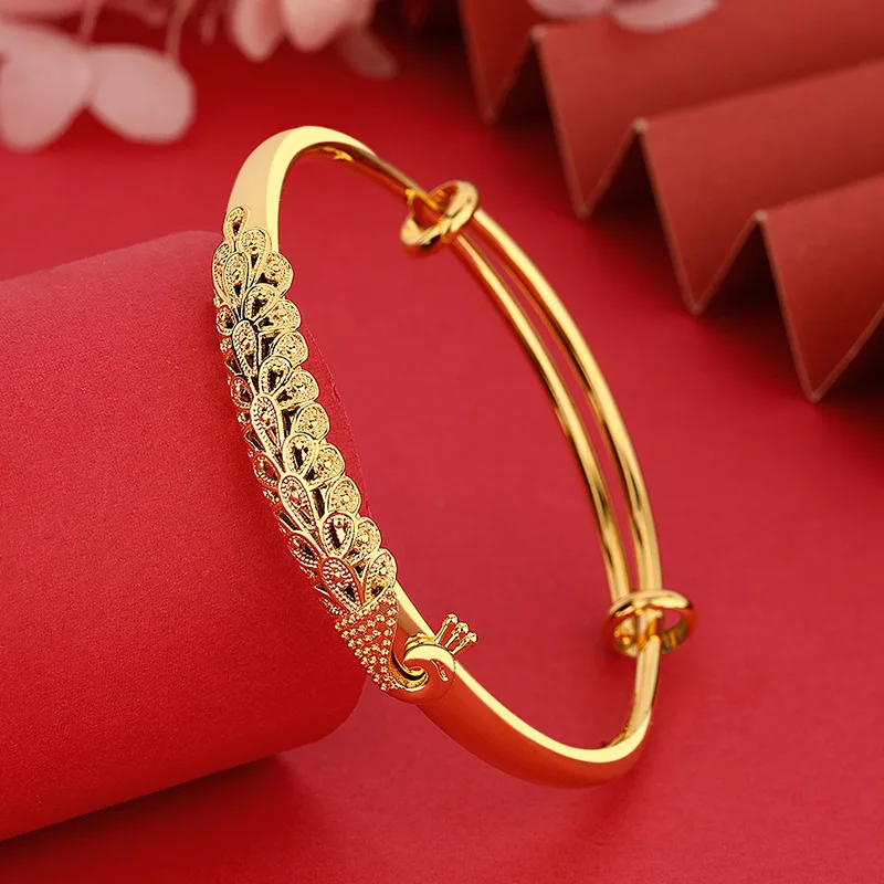 AU999 24K Gold Phoenix - กําไลข้อมือนกยูง |   นกที่ทอกลวง เพชร - ชุดขนนก พราว