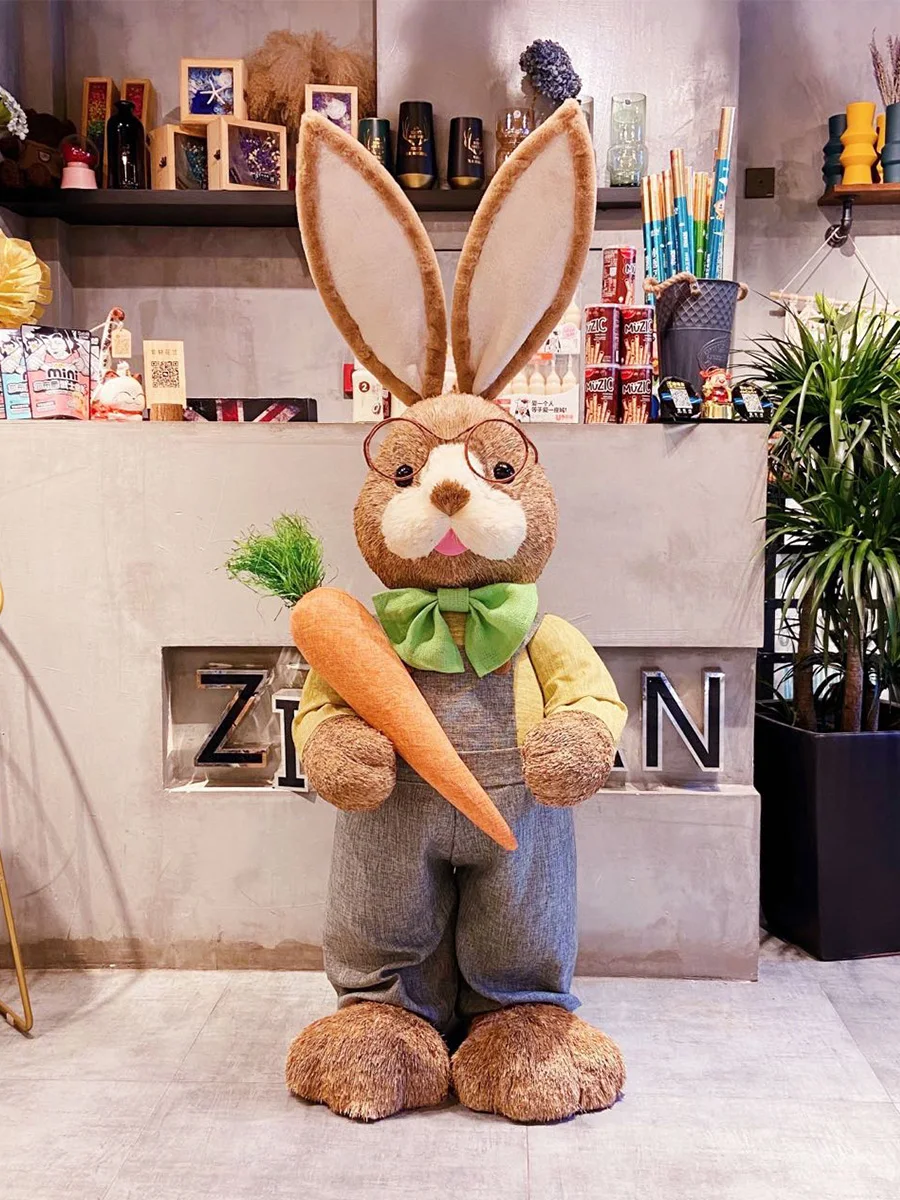 Floor-to-ceiling straw rabbit ornaments in the living room