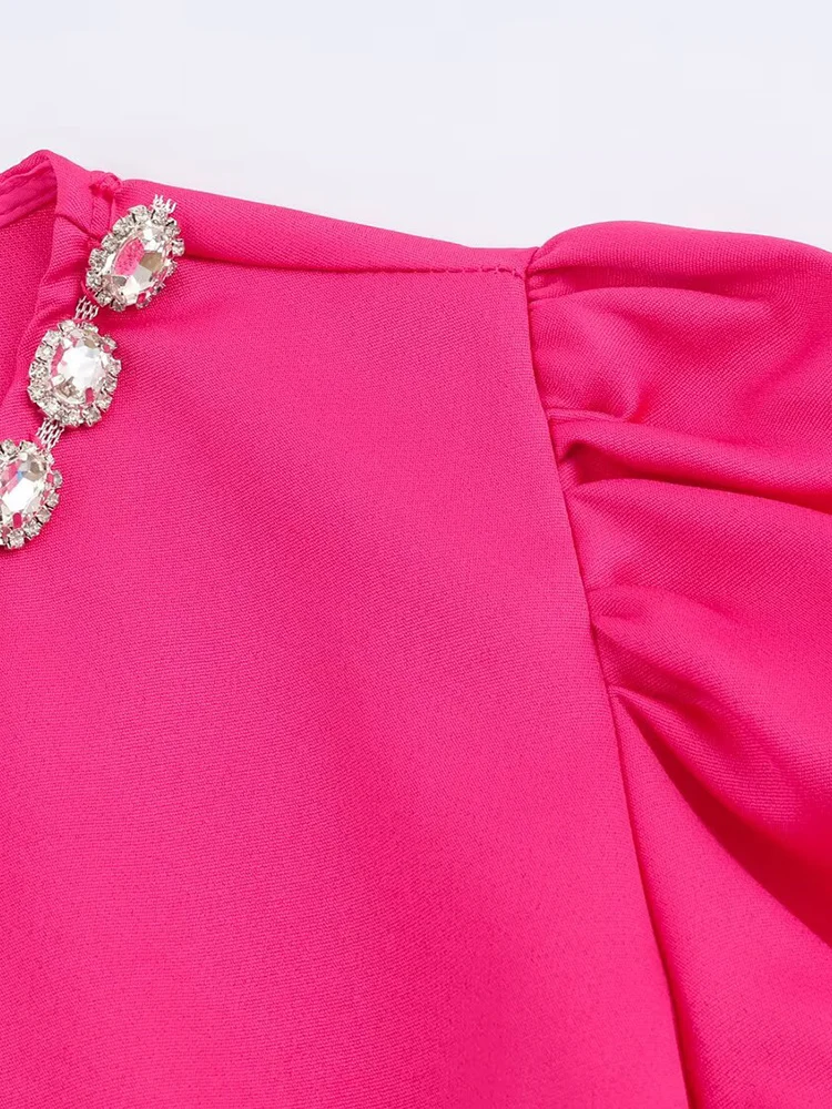 New European-style women's fashion set: stylish and versatile top and skirt set with elegant rhinestone embellishments.