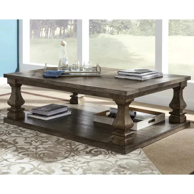 QAZ8-Signature Design by Ashley Johnelle Farmhouse Coffee Table with Weathered Gray Finish. Gray