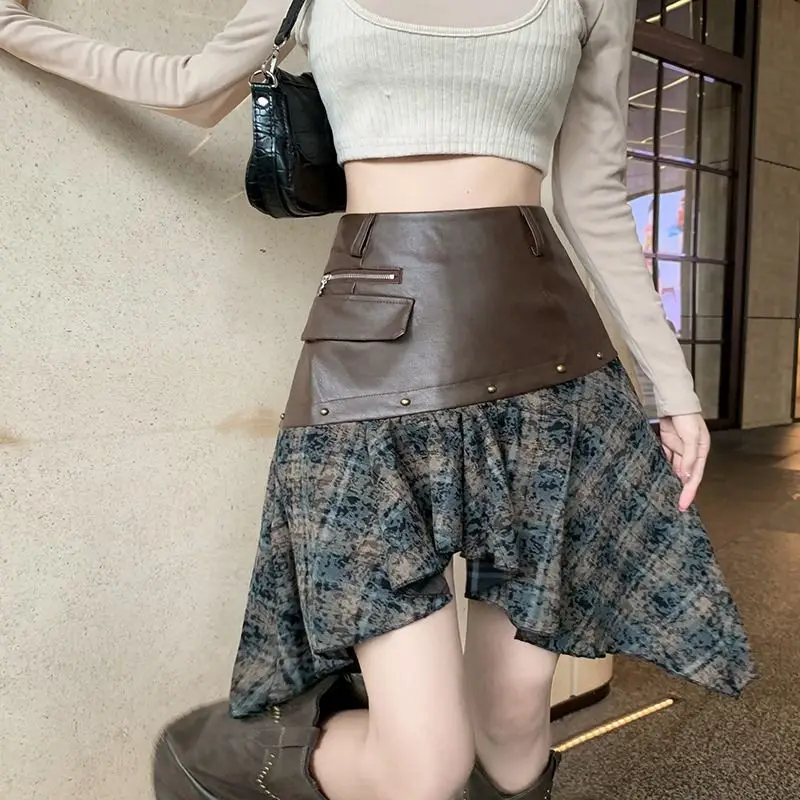 

2024 Early Autumn New Fashionable Leather Cowboy Splicing Irregular Checkered Half Skirt Short Skirt women clothing