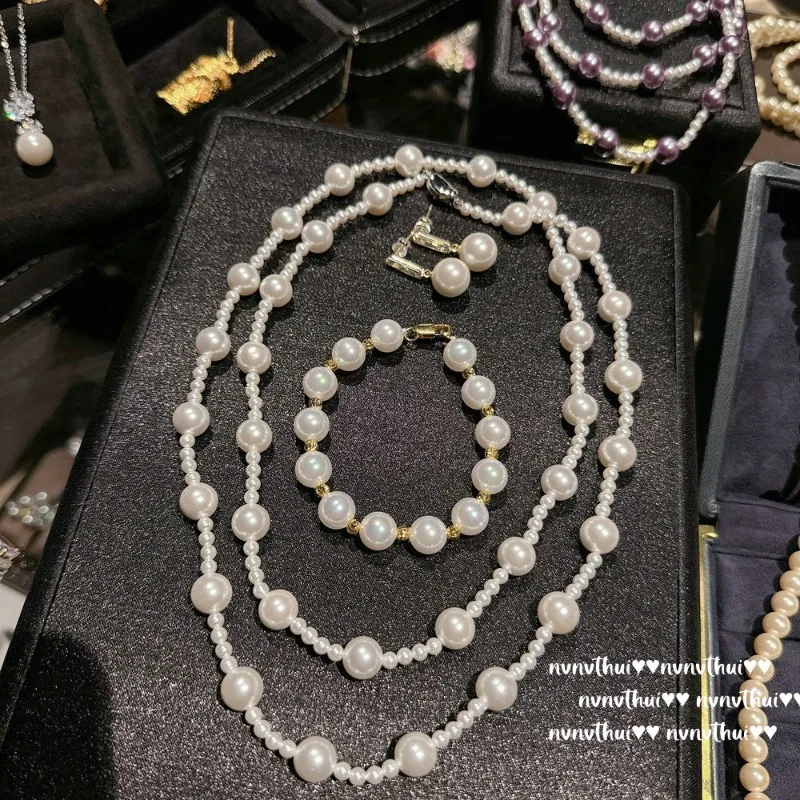 

Капли воды заката, длинное жемчужное ожерелье из настоящей конопли Aobai, таити, цепочка для свитера из фиолетовых бусин павлина