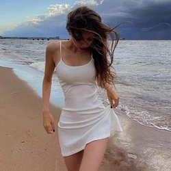 Women's Summer Mini Slim Dress Solid Color Ribbed Sleeveless Camisole Dress Revealing Backpack Buttocks Beach Vacation Dress