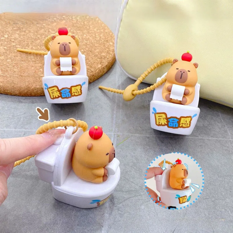 

Cute Capybara Squeaky Sound Keychain Toilet Shaped Pendant Funny Squishy Noise Toy Bag Charm Cartoon Animal Key Ring Soft Touch