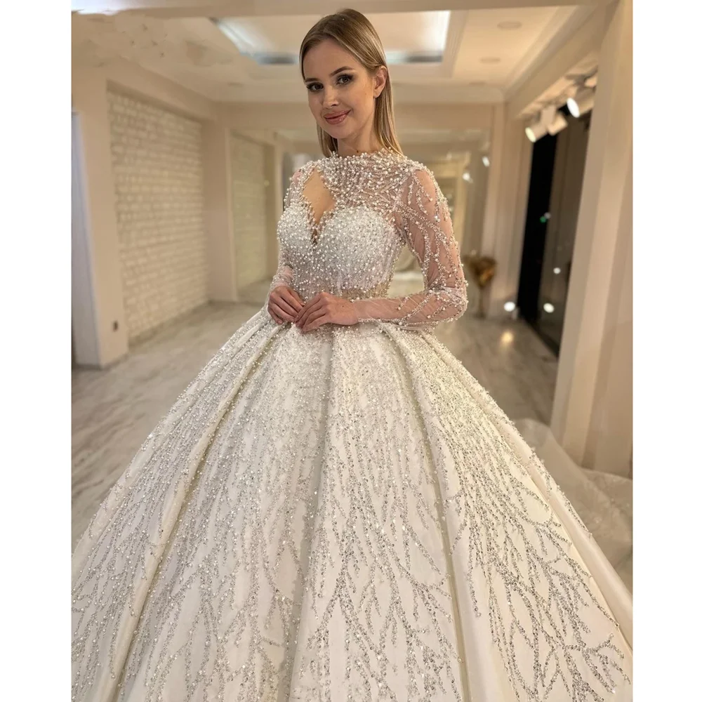 Exquisite White Pearls Wedding Dresses Fashion Beads Sequined Ball Gowns Luxury Long Sleeves Court Train Women Bridal Dresses