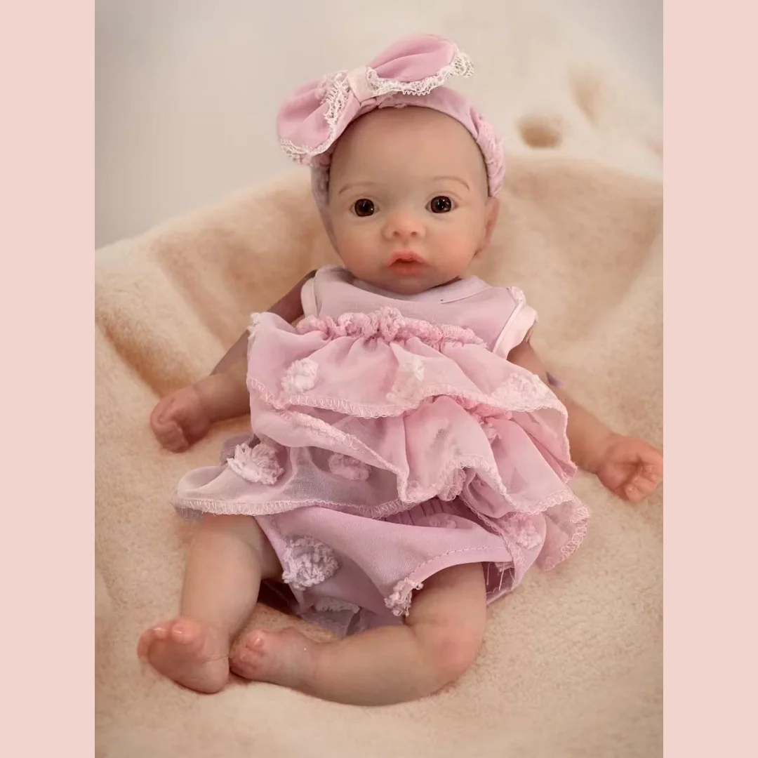 ตุ๊กตาซิลิโคนรีบอร์นเด็กผู้หญิง ขนาด 10 นิ้ว/25 ซม. ปากเปิด ล้างทำความสะอาดได้ ทั้งตัว ทำจากซิลิโคน ผิวทาสี 3 มิติ เหมือนจริง พร้อมชุดสีชมพู