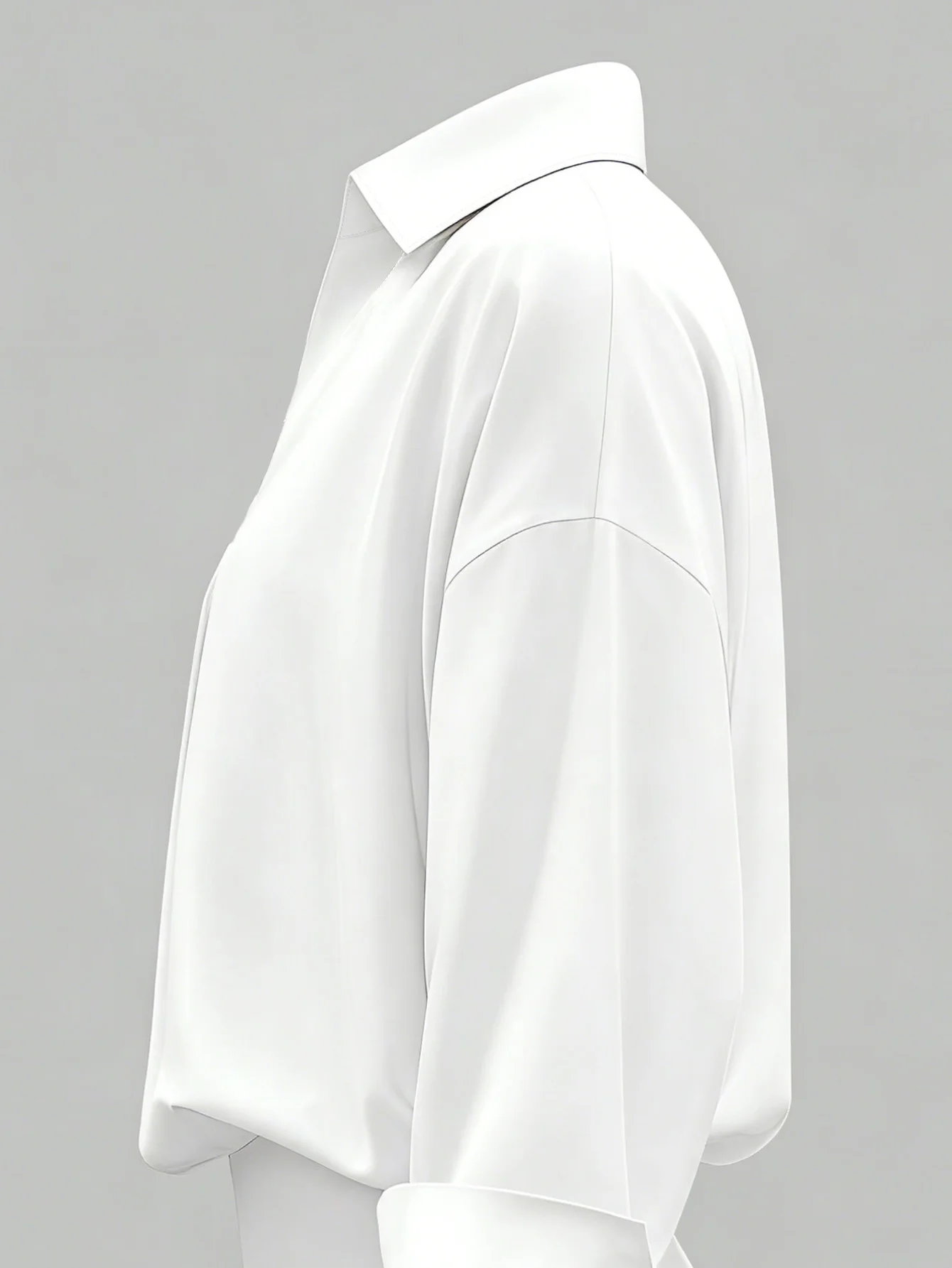 Oversized solid-colored jumpsuit with long sleeves in a versatile shirt style