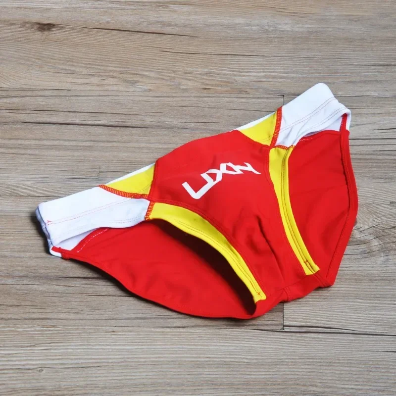 Classic 2025 men's fashion stitching briefs Japanese show beach swimming trunks close-fitting briefs UXH026