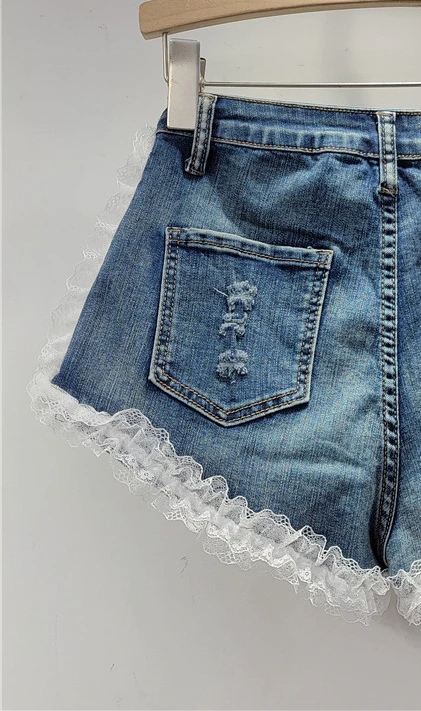 Herbst Neue Vintage-Mode Sexy Mädchen Seite Zipper Spleißen Spitze Mesh Waschen Wasser Alte Denim Shorts Hot Pants Shorts für Frauen