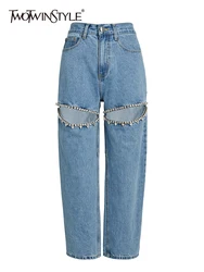 TWOTWINSTYLE Jeans svasati ricamati per le donne bottone Patchwork a vita alta scava fuori i pantaloni estivi a gamba larga moda femminile nuovo