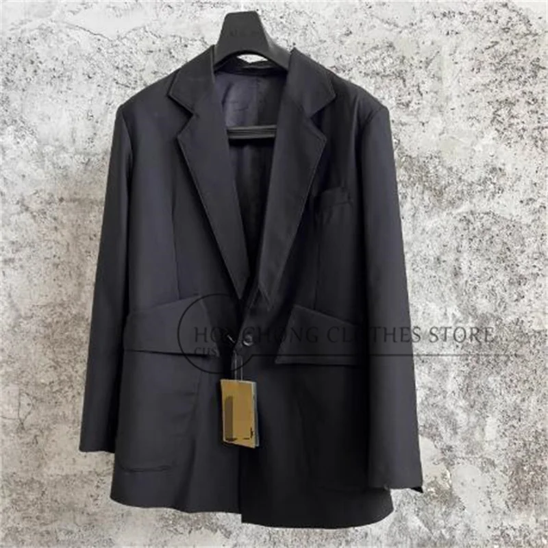 Original fashionable suit with collar. Solid color with irregular hem. Design with large pockets. Coat.