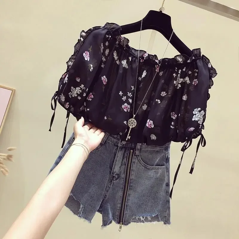 One-shoulder blouse women's short-sleeved summer 2023 new Korean version of loose and sweet leaky shoulder floral chiffon shirt