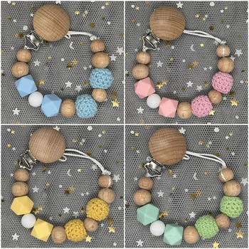 赤ちゃんの歯が生えるおもちゃ用の丸いシリコンビーズ、おしゃぶりクリップ、手作りのブナ材のチェーン、動物のダミーの噛むギフト、ホット