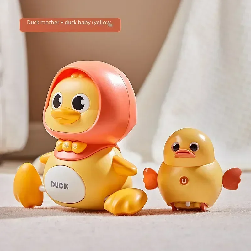 Wobbling Duck Mom lenitivo elettrico strisciante attrazione magnetica giocattolo per la pratica del bambino giocattoli elettronici per bambini animali domestici Тамагочи