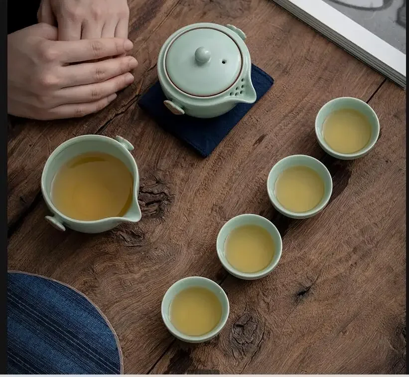 

Portable Travel Tea Set Ceramic Kung Fu Teapot Teacup Making Equipment Tools One Pot and Four Cups Teaware Sets