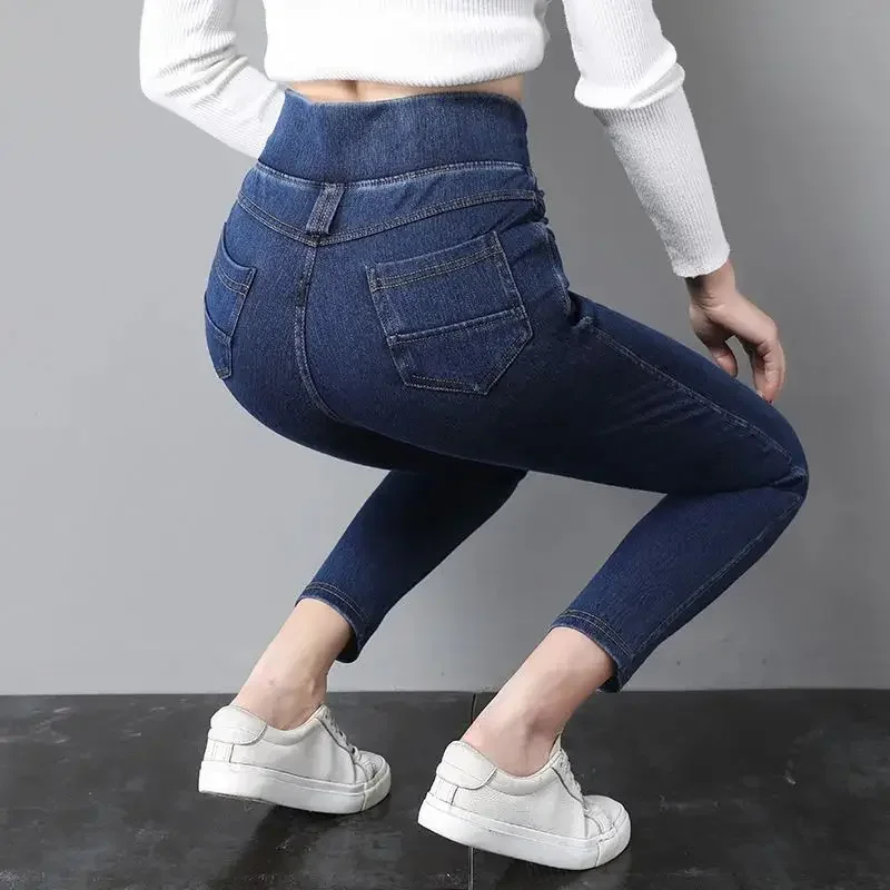 Moda damska duże rozmiary obcisłe dżinsy wiosna jesień Streetwear spodnie typu casual Denim kieszenie elastyczne spodnie ołówkowe z wysokim stanem E4708