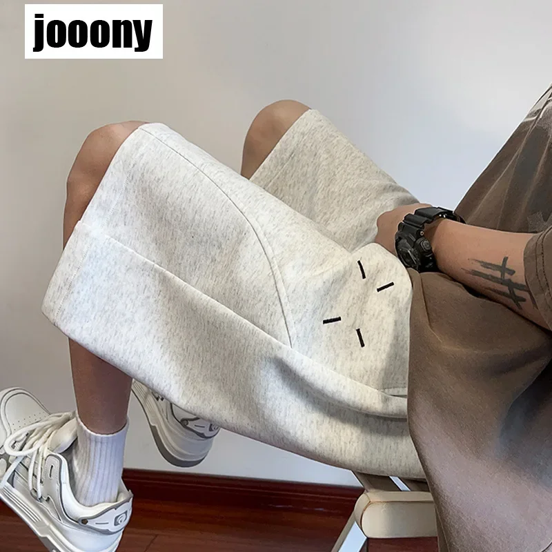 

Новинка 2024, корейские шорты с вышивкой, мужские летние свободные спортивные средние брюки, повседневные универсальные повседневные модные брюки