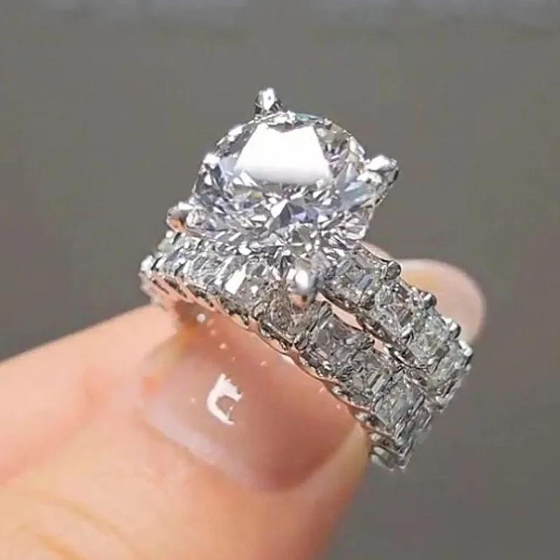Huitan Ensemble de 2 bagues tendance pour femme, style éternité, avec zircone cubique, double empilage, bijoux de luxe pour fête 2026