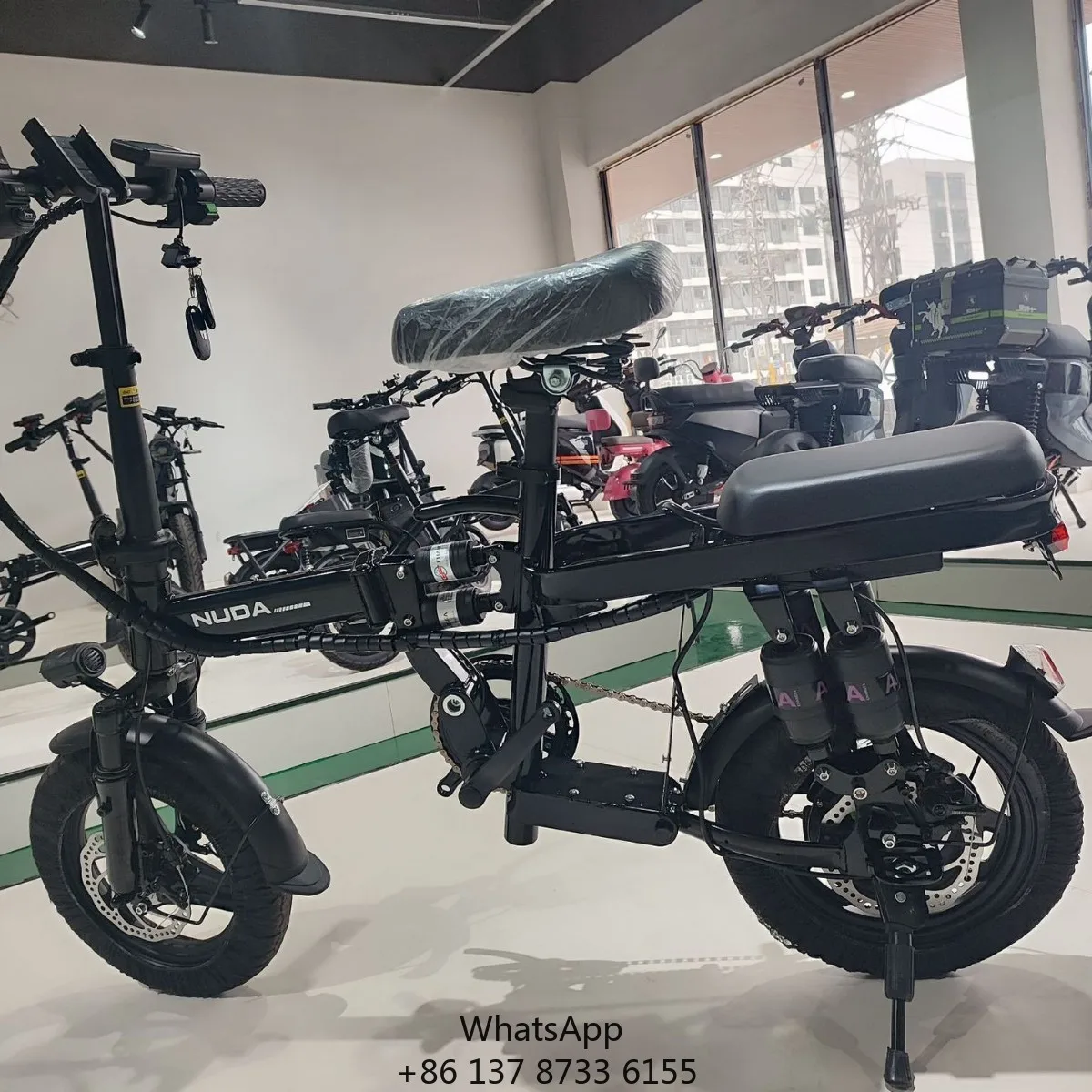 

14 Inch Ultra-Light Folding High Carbon Steel Middle Shock Electric Bicycle 48V20A Lithium Battery Portable Small For Wholesale