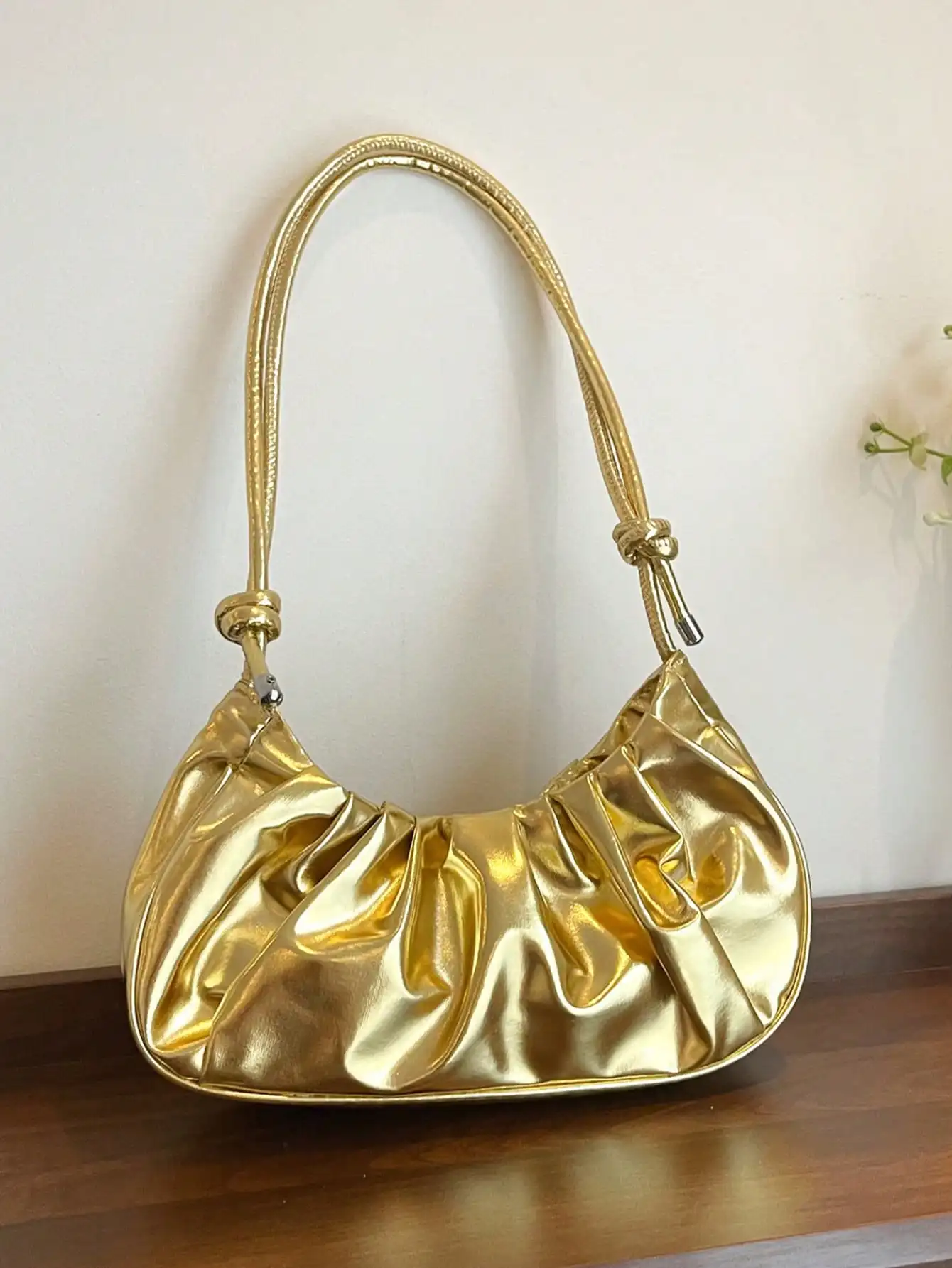 

Gold Metallic Pleated Crescent Shoulder Bag with Knotted Strap