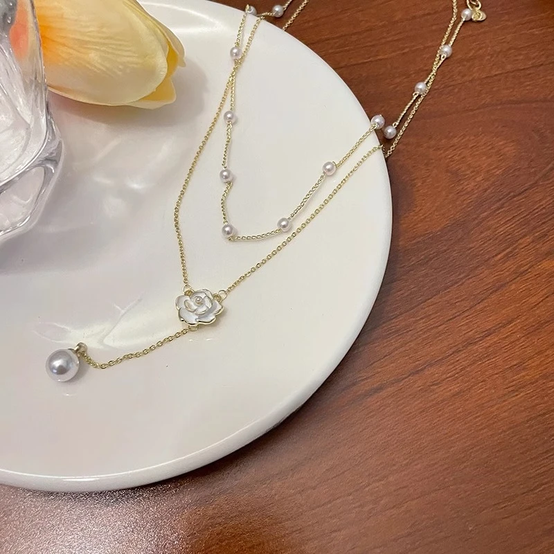 Colar de pérolas com borla de camada dupla feminino nova corrente de clavícula de camélia luz luxo acessórios de corrente de pescoço de alta qualidade