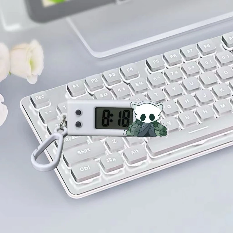 สินค้าอนิเมะการ์ตูน Hollow Knight ใหม่ นาฬิกาอิเล็กทรอนิกส์เงียบ ทันสมัยและสร้างสรรค์สำหรับนักเรียน นาฬิกาอิเล็กทรอนิกส์แบบติดกระเป๋า