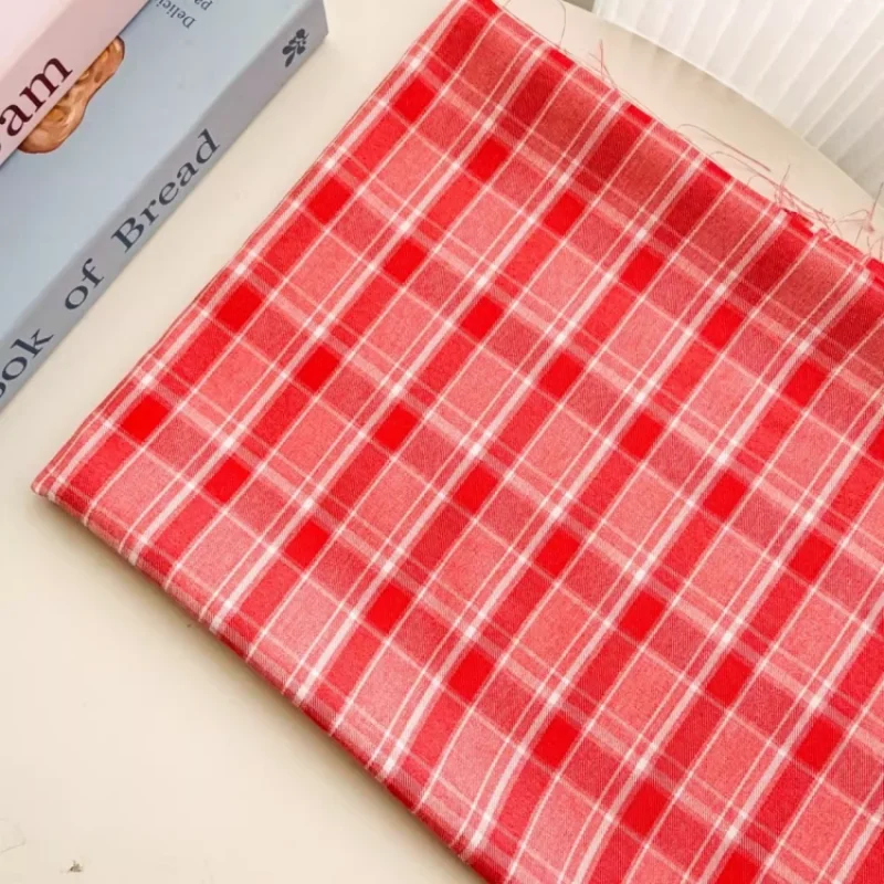 

Red checkered cloth is used to make hair rings, bags, clothing, background fabrics, tablecloths, and other fabrics.
