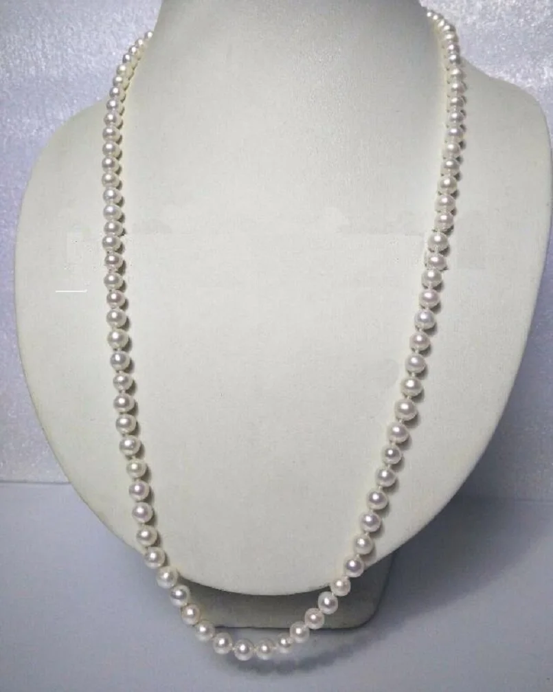 

24 inch brand new AAAA 6-7mm Japanese Akoya white pearl necklace with 14K buckle