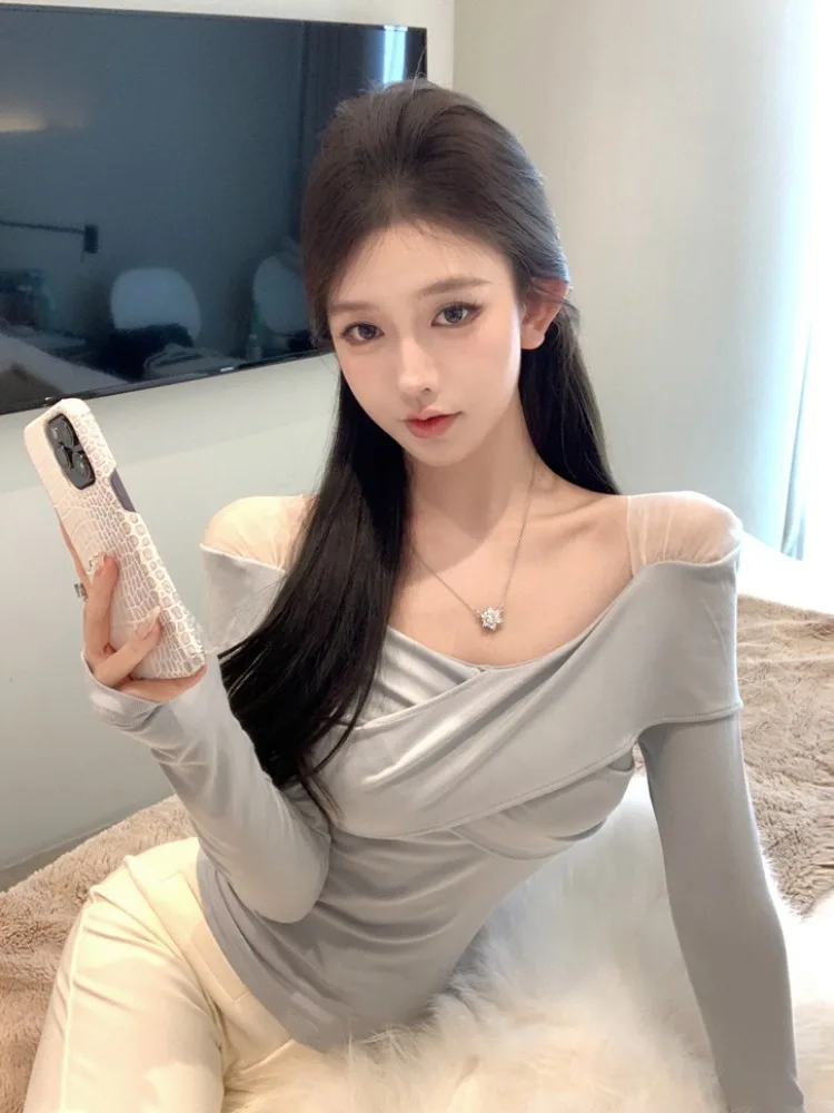 

Pure Desire Spicy Girl Style Mesh Splice Shoulder Bared Long Sleeve T Shirt Women's Autumn Winter New Design Cross Personalit...