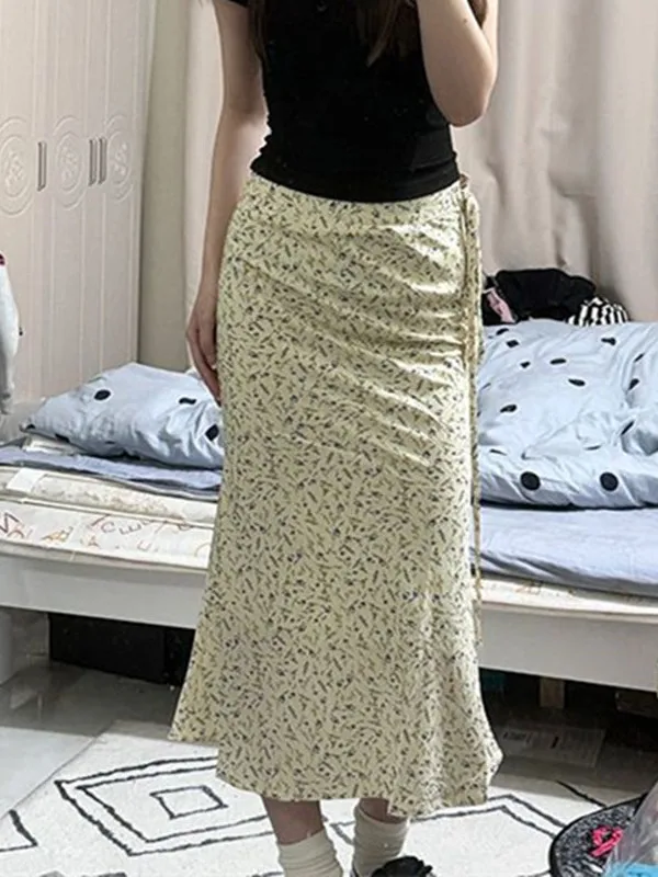 Slim fit high waisted Korean style slimming mid length skirt with straps and buttocks French fresh countryside floral half S9B1