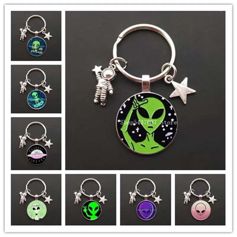 

Funny alien key ring glass cabochon bag car key chain astronaut key chain pendant male and female key chain gift jewelry