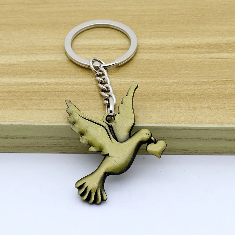 Catholic Christianity Jesus Holy Spirit Peace Dove Retro Jewelry Necklace Exquisite Car Keychain Pendant Keychain Wholesale