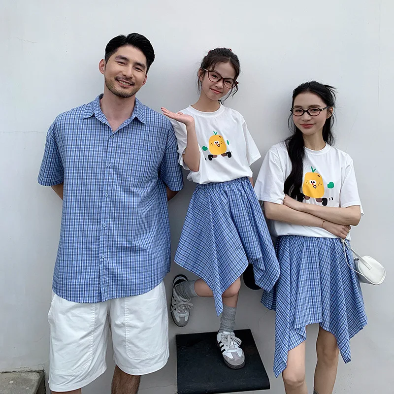 

2026 Summer Korean Blue Plaid Family Matching 3P Cartoon T-shirt Irregular Skirt Set Beach Vacation Outfits for Mom Dad Kids