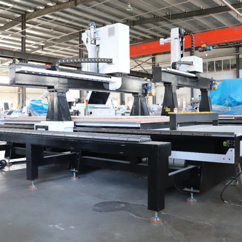 The 1325 CNC wood carving machine with laser marking capability is ideal for furniture manufacturing.