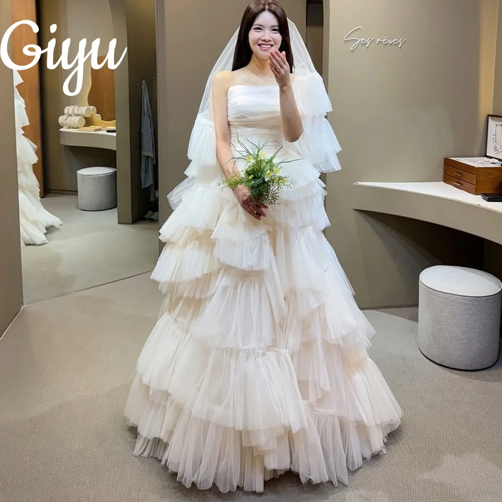 فستان زفاف حديث جديد بدون حمالات من Giyu مطوي متدرج من التل بدون أكمام زي العرائس لالتقاط الصور الكورية حسب الطلب 2025 #1