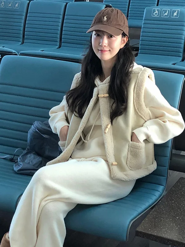 Chic hiver nouveau Sle femmes en cuir fourrure intercé gilet manteau avec bouton conception Faionable Anti-âge à la mode