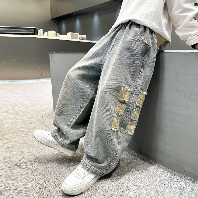 نمط جديد الأطفال فضفاض مستقيم دمرت الجينز للمراهقين الصبي عادية ممزق الدينيم السراويل الكورية الاطفال موضة بنطلون سن 4-14Y