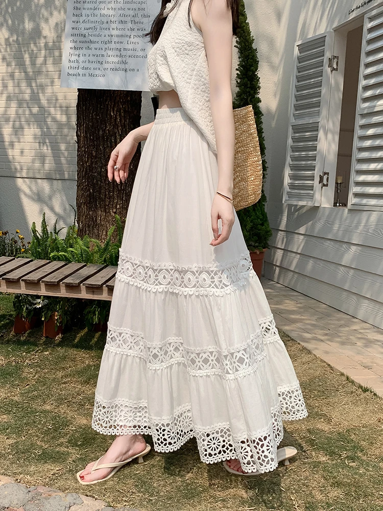 Boho oeillet dentelle broderie ourlet jupe longue d'inspiration vintage été a-ligne jupe à plusieurs niveaux avec taille élastique vacances à la plage
