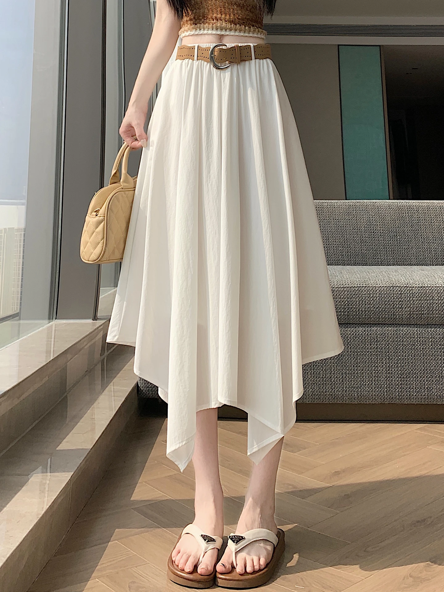 

Асимметричная белая юбка миди с высокой талией, летняя, новая, в стиле дзен, свободного кроя, скрывающая бедра, фасон «зонтик»