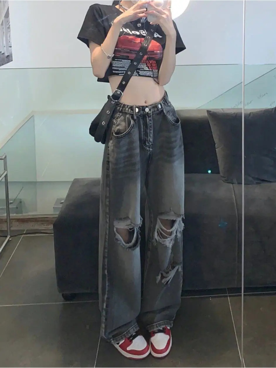 بنطلون جينز أمريكي بتصميم ممزق للنساء، موديل شتوي جديد بأسلوب الشارع الراقي، فضفاض بخصر عالٍ، نحيف وواسع الساق، كاجوال بلون غامق