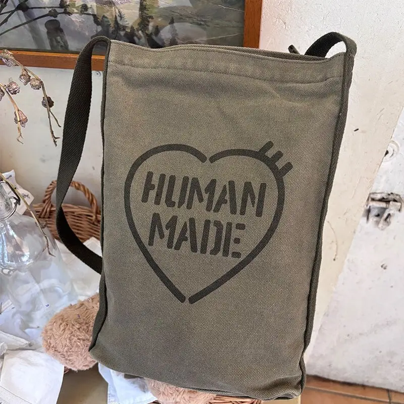 HUMAN MADE Military Pouch Olive Green Nylon Heart Logo Text Strap Crossbody Bag