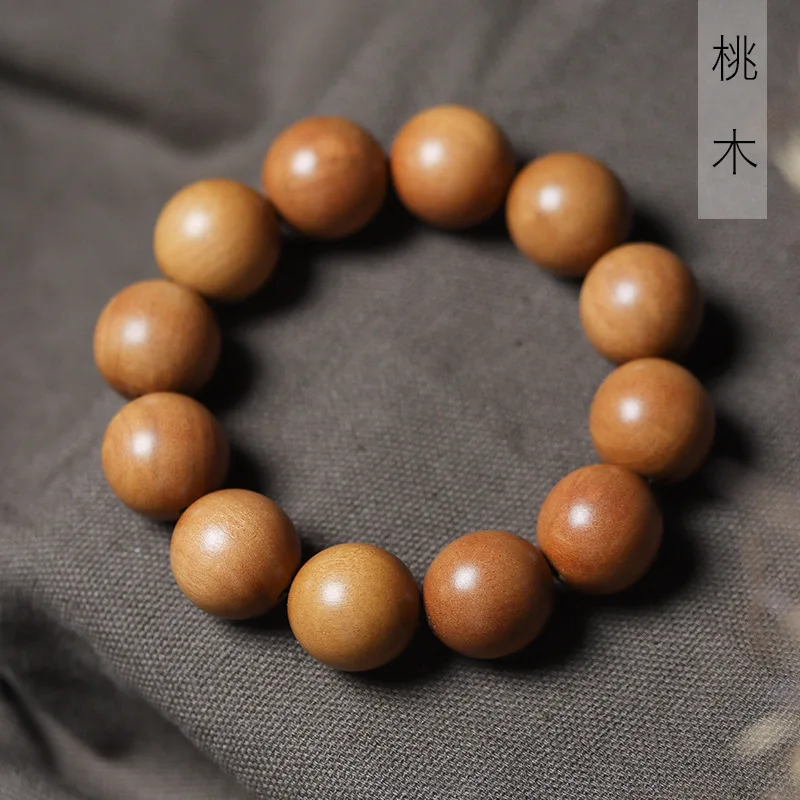 

Peach wood round bead bracelet, single-loop style, unisex, minimalist design, decorative prayer bead jewelry, decorative hand ac