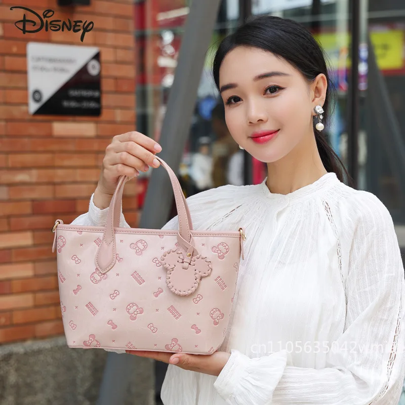 ديزني ميني 2026 حقيبة يد نسائية جديدة موضة عالية الجودة حقيبة كروس نسائية بلون متعدد الاستخدامات حقيبة تخزين الهاتف للفتيات
