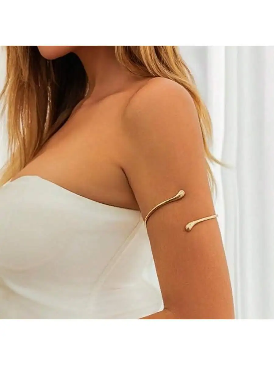 

Регулируемые золотые многослойные запонки-манжеты — украшения для рук в богемном стиле, подходящие для летних пляжей и отпуска.