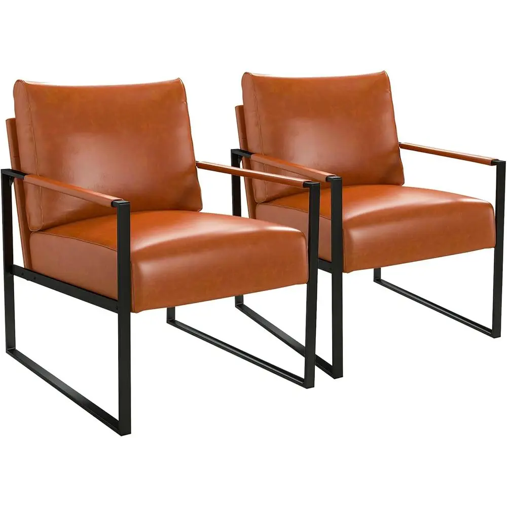 

Пара коричневых кожаных кресел с металлическими подлокотниками, мягкой спинкой и подушками для гостиной, офиса или спальни